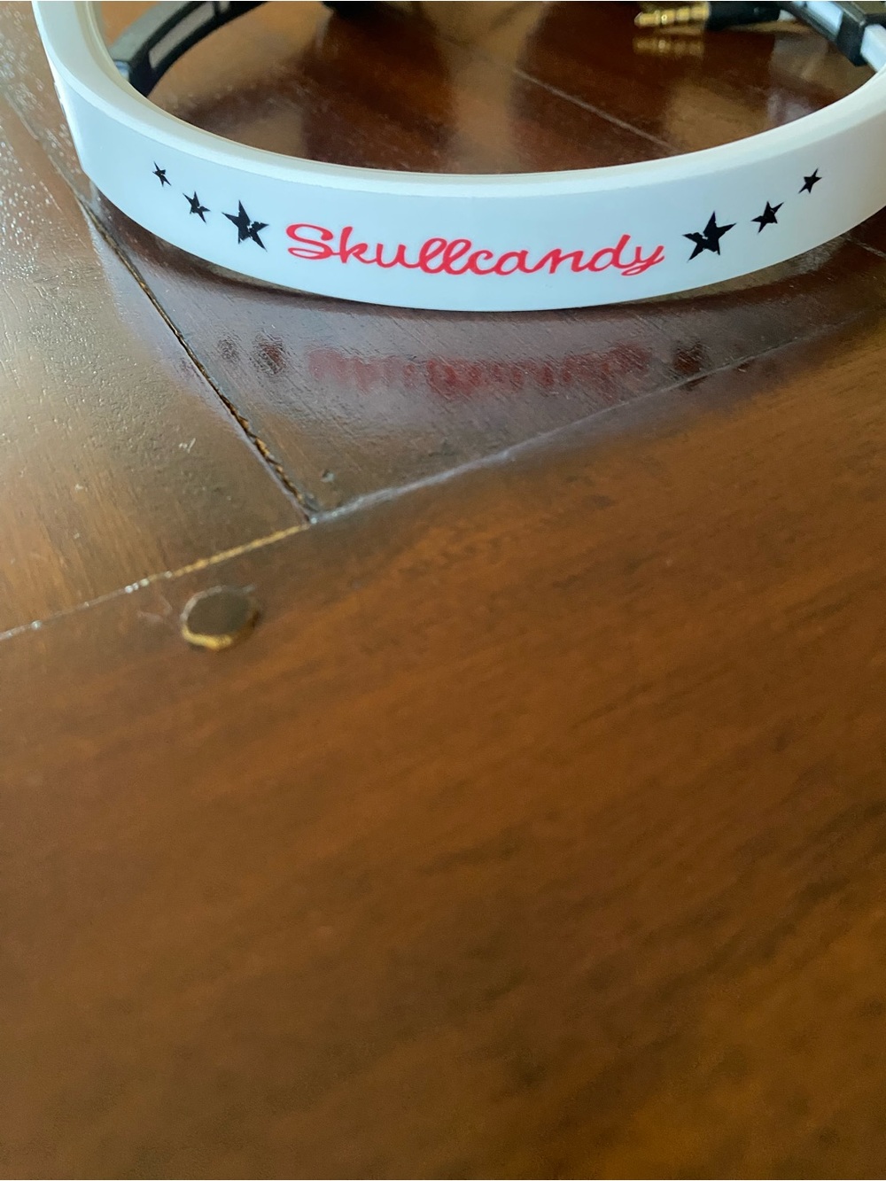 Skullcandy White Headband with Pink Logo and Black Star Details